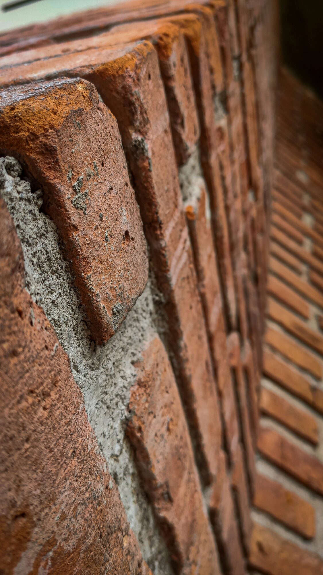 Historic building facade showing successful restoration with cleaned and sealed masonry surfaces, demonstrating quality craftsmanship